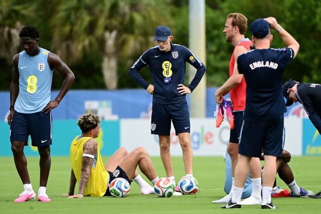 England head coach Thomas Tuchel (centre right) and Nico O'Reilly during a training session at Palm Beach Gardens, Florida.
JC Ruiz/PA Wire.