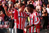 Sheffield, England, 21st March 2026. Andre Brooks of Sheffield United celebrates with Sydie Peck of Sheffield United after scoring to make it 1-0 during the Sheffield United vs Wrexham Sky Bet Championship match at Bramall Lane, Sheffield. Picture credit should read: Jake Youle / Sportimage