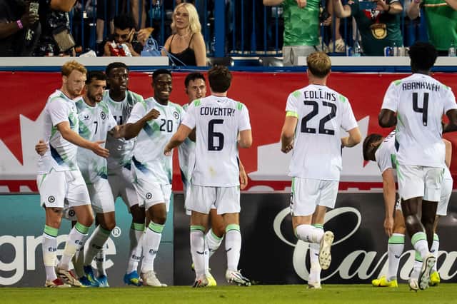 Republic of Ireland's Chiedozie Ogbene (20) celebrates his goal against Canada with teammates during second half of an International Friendly soccer match in Montreal, on Friday, June 5, 2026. (Christopher Katsarov/The Canadian Press via AP)