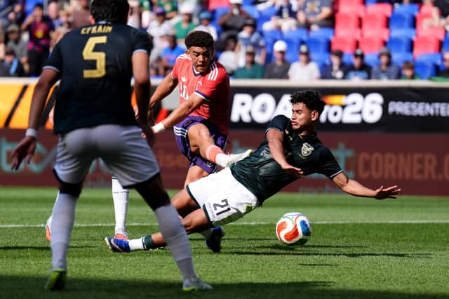 Scotland's Che Adams (centre) scores his sides fourth goal during the international friendly match at the Sports Illustrated Stadium in Harrison, New Jersey. Andrew Milligan/PA Wire.