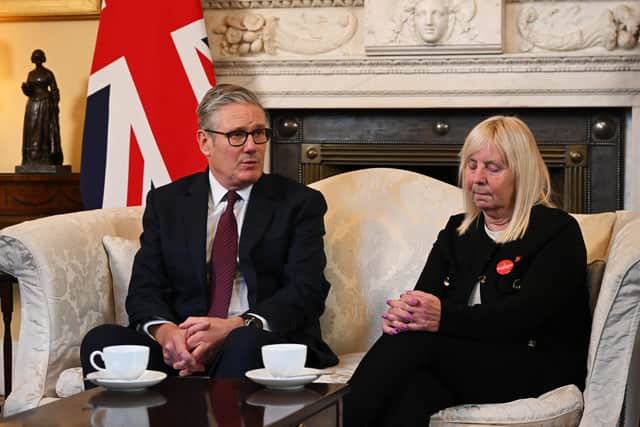 Sir Keir Starmer speaking with Margaret Aspinall, during a meeting with family members of the victims of the Hillsborough disaster (Leon Neal/PA)