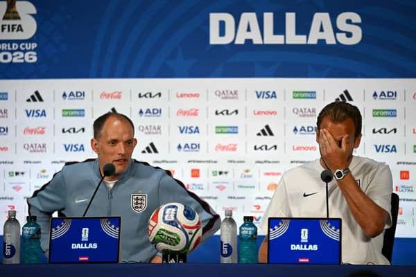 England's Harry Kane (R) gestures next to German head coach Thomas Tuchel (L) as they give a press conference at the Dallas Stadium in Arlington on June 16, 2026, on the eve of the 2026 World Cup Group L football match between England and Croatia. (Photo by Paul ELLIS / AFP via Getty Images)