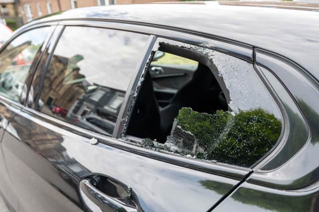 Car with smashed window in Crookes after vehicles were attacked on Carson Road and Forres Road.