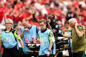 Ismaël Koné suffered a nasty injury in Canada’s 6-0 win over Qatar.