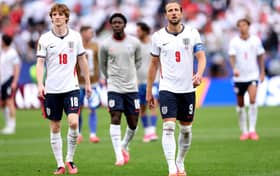 Anthony Gordon #18 and Harry Kane #9 of England react after the scoreless draw during the FIFA World Cup 2026 Group L match between England and Ghana at Boston Stadium 