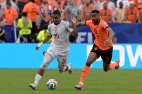 Yan Valery (left) started all three of Tunisia’s World Cup outings.