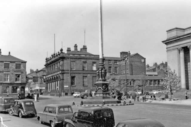 The war memorial at Barker's Pool, Sheffield, in May 1960, with City Hall on the right and the Albert pub to the left