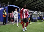 Japhet Tanganga of Sheffield United leads the team out for the first game of the new season during the Halifax Town vs Sheffield United Pre Season Friendly match at The Shay, Halifax.  Andrew Yates / Sportimage