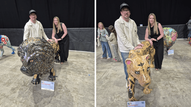 Matt and his wife Lynsey pose with lions Florence and Dennis which have been named after his grandparents.