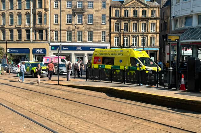 The police scene near Cathedral tram stop at around 4.30pm. A pedestrian was reportedly in a collision with a car.