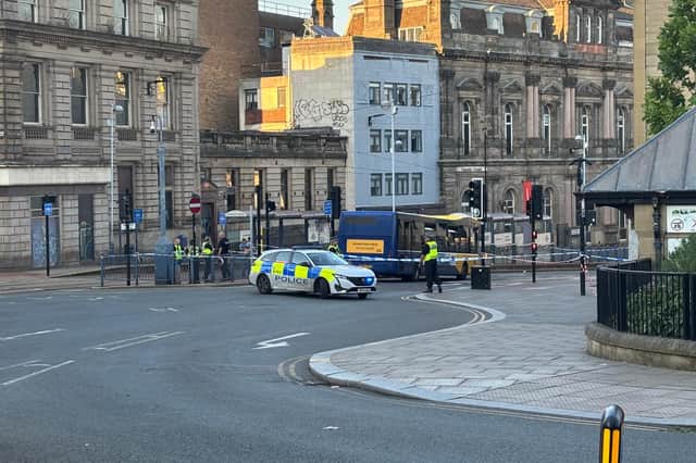 The scene on Commercial Street tonight. Yorkshire Ambulance Service confirmed in a statement a pedestrian was hit by a bus.