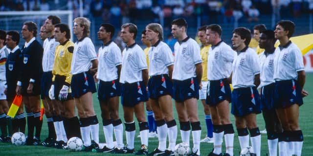 England players, including Chris Waddle, line-up for the national anthems ahead of the World Cup semi-final against West Germany in 1990.