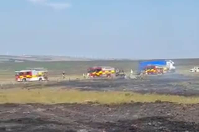 Fire engines along the Woodhead Pass after the blaze had started. Photo: Peak District Moorland Group