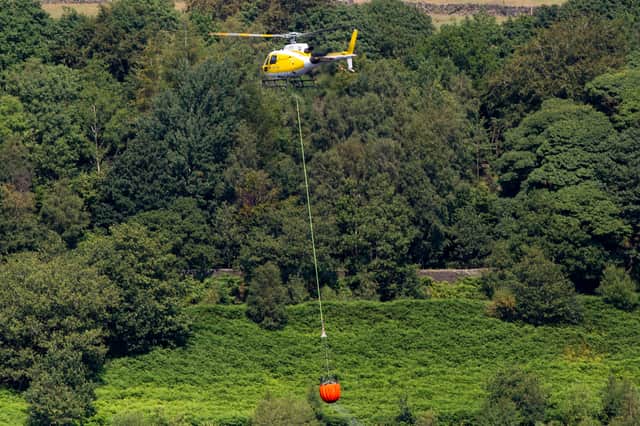 Fire helicopters tackling the wildfire in the Peak District