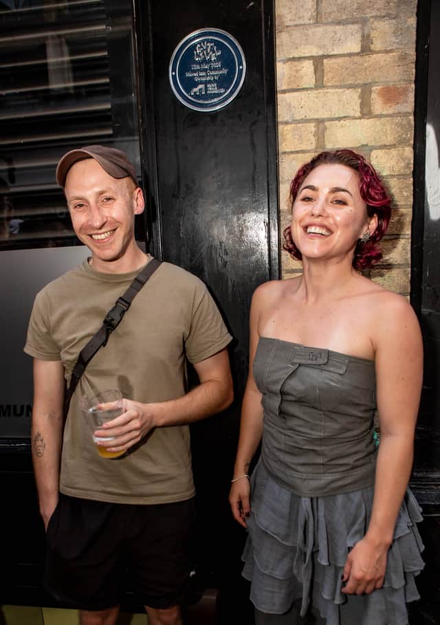 Gut Level's Frazer Scott and Katie Matthews outside the club on Chapel Walk. A plaque was revealed on July 24, 2026, in celebration of the venue purchasing its own home.