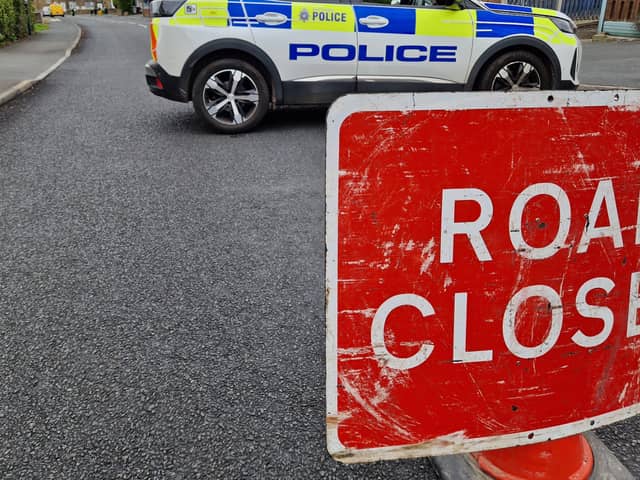 Police on the scene after a serious crash which closed a road in Sheffield. Photo: David Kessen, Iconic Media