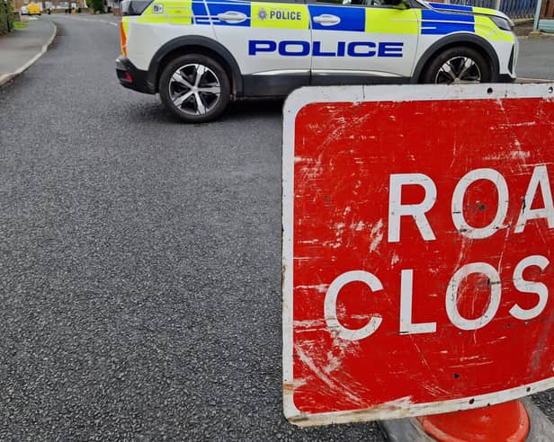 Police on the scene after a serious crash which closed a road in Sheffield. Photo: David Kessen, Iconic Media