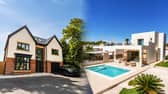 The £1.8 million prize package includes properties in Lancashire and Spain, two cars and £50,000