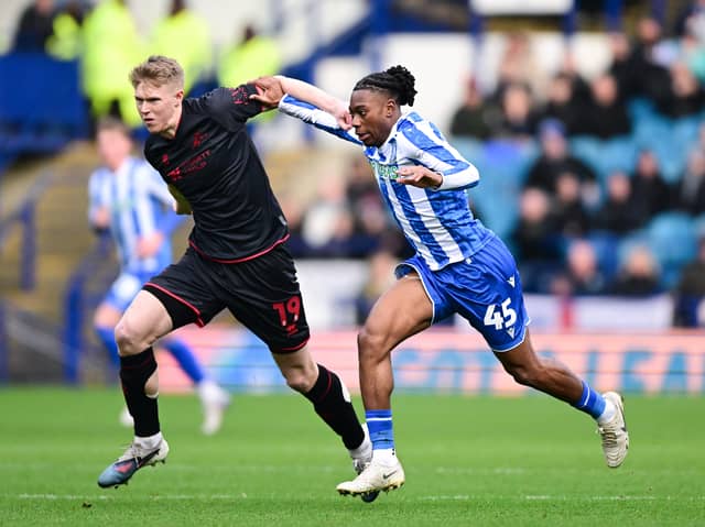 Tayo Adaramola (right) has sealed a permanent move to Belgium.