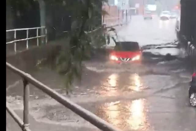 A car struggles through deep water under a bridge at Upwell Street, near Brightside, Sheffield. Photo: Submitted