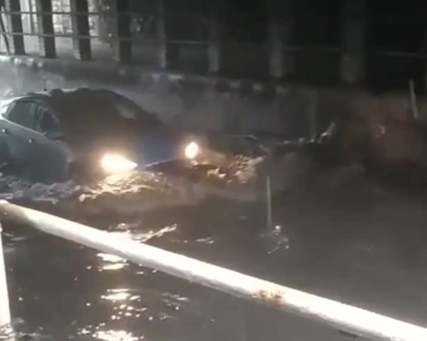Driver braves floodwaters at notorious Upwell Street. Pictures and video by Mr  Mariusz.