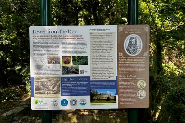 A sign explaining the building's history has been installed.
