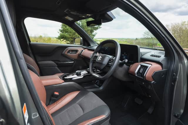 The tan half-leather option really lifts the interior