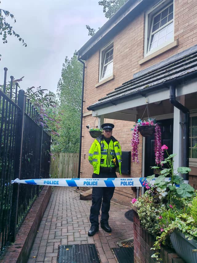 Police continue to guard a house in Wincobank, Sheffield, following the death of a baby girl