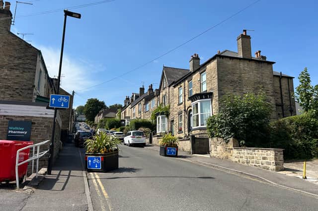 Planters on Greenhow Street let drivers know the street is one way
