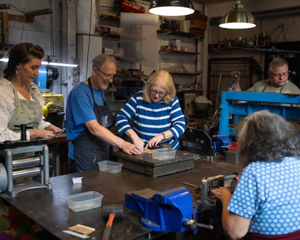 Friends of Meersbrook Hall visiting Quirky Metals in Heeley, Sheffield to help make pewter brooches and bookmarks. Picture: Gemma Thorpe, FOMH