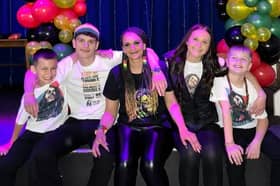 Louennie Williamson is pictured alongside her four children, Danny, 20, Elyssia, 16, Sonny, 11 and Saul, 10. 