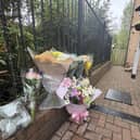 Flowers left at the scene in Holywell Heights, Sheffield