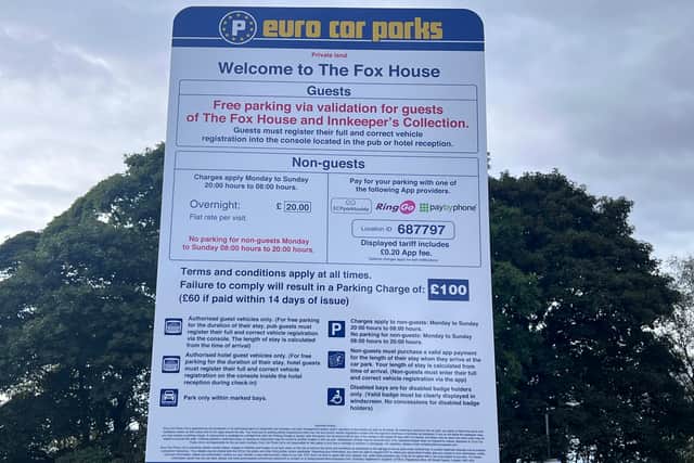 The Fox House offers free parking for customers who register on a tablet near the bar.