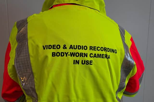 A high visibility vest is pictured stating video and audio recording is in use. This follows the council's announcement that school crossing patrol wardens will be given body-worn cameras to improve safety.