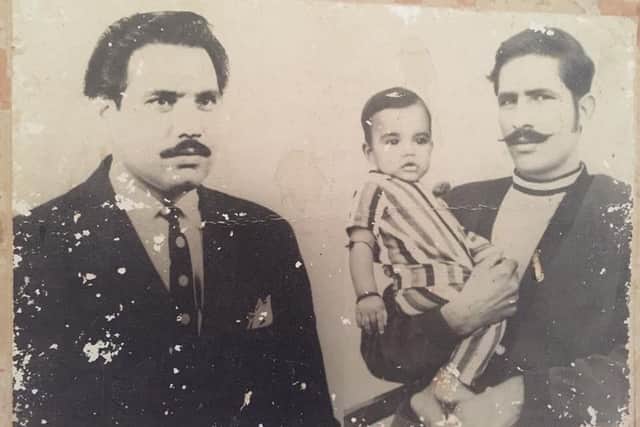 Lord Mohammed's father Muhammad Saddique (left with suit and tie) and his uncle Mohammed Ishaq holding him at 13-months old. Both have passed away and never got to see him progress into politics.