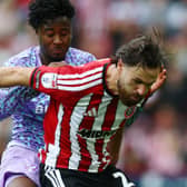 Andre Brooks of Norwich City tackles Ben Brereton Diaz of Sheffield United  during the Sheffield United vs Norwich City Sky Bet Championship match at Bramall Lane, Sheffield. 