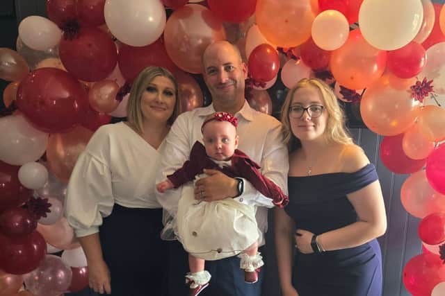 Andrew Tubbs with wife Emma and daughters Tegan and Erin. The photo was taken at Erin's Christening, just a week before the collision which tragically took Andrew's life