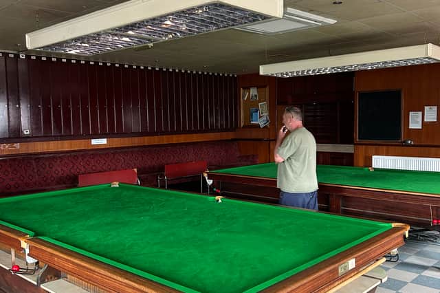 Mr Mullen is considering moving the snooker tables downstairs to convert this room into a flat and bring in more money for the club.