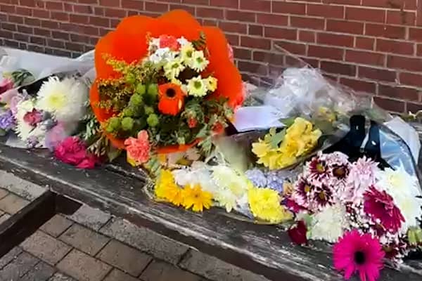 Flowers laid outside The Star Hotel, in tribute to Jonathan Round. 
