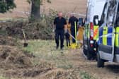 Officers dig out a pond in a field in Aston in the search for Teresa Shephard.