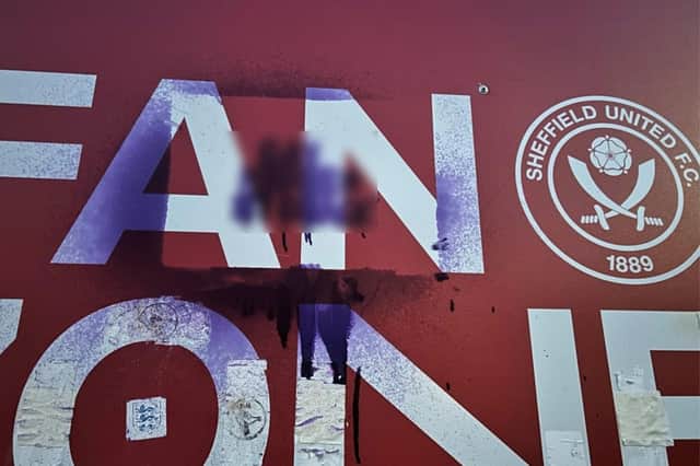 One of the "racist and homophobic" messages painted by Aird