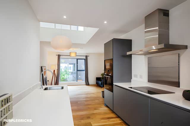 The bespoke kitchen creates a sociable heart to the home, complete with Bosch appliances and space for cooking and entertaining