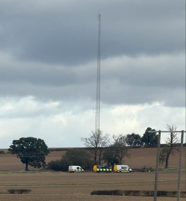 At least three police vans were pictured surrounding a small thicket of trees in a field off Worksop road in Aston on September 15, 2026.