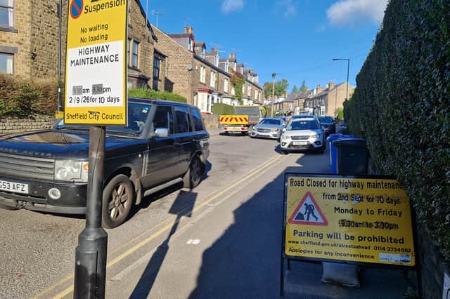 Cars are being damaged by "huge" potholes on Osborne Road, a councillor claims.