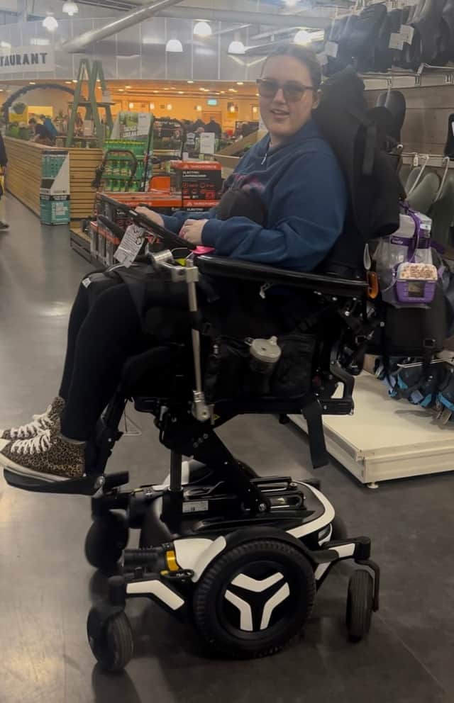 A properly fitted electric wheelchair would allow Evie to live a full life with independence and comfort - but a poor-fitting one can mean so much pain she often must leave early to go home and rest.