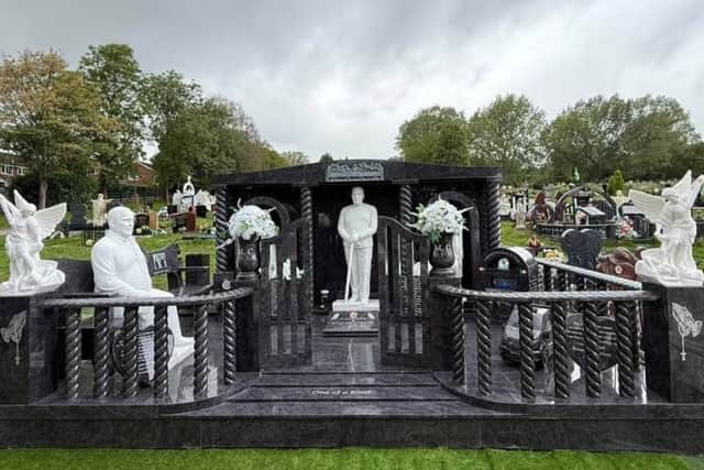 Standing at nine-and-a-half feet tall, the lavish memorial to Michael Collins features two life-like statues of him, along with a marble pint of Guinness, a pint glass bearing the initials “MC” and embossed depictions of a can of Diet Coke and a bottle of Budweiser