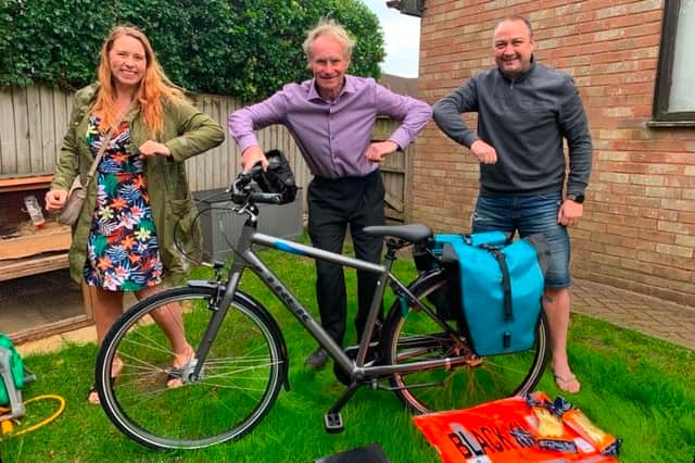 Geoff Evans with a bike donated to him to help with his litter picking