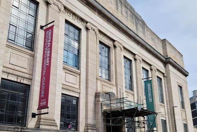 Scaffolding and hoardings have covered Sheffield Central Library since 2023 due to structural concerns about falling masonry.