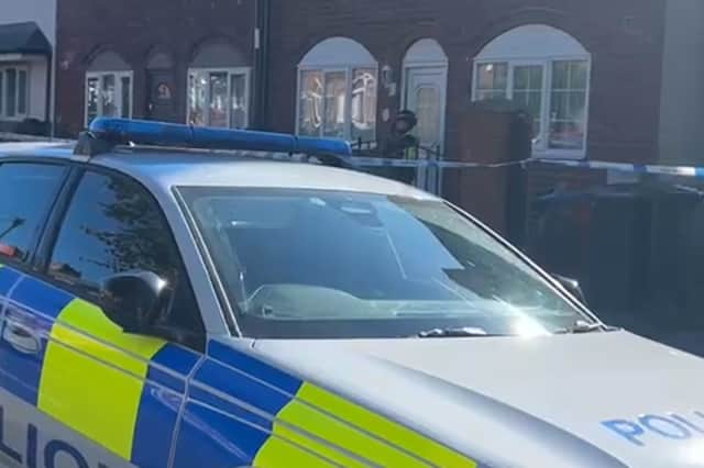 A police car parked outside a house on Heather Road, near Firth Park, Sheffield, today. Photo; Dean Atkins, Iconic Media
