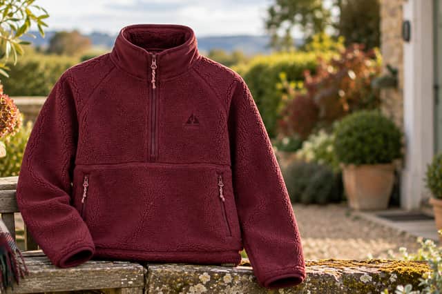 The Ayacucho Tenby Half Zip Fleece in Huckleberry is warm and cosy, with a high collar and relaxed everyday feel.